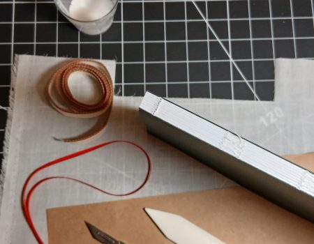 Book spine being lined